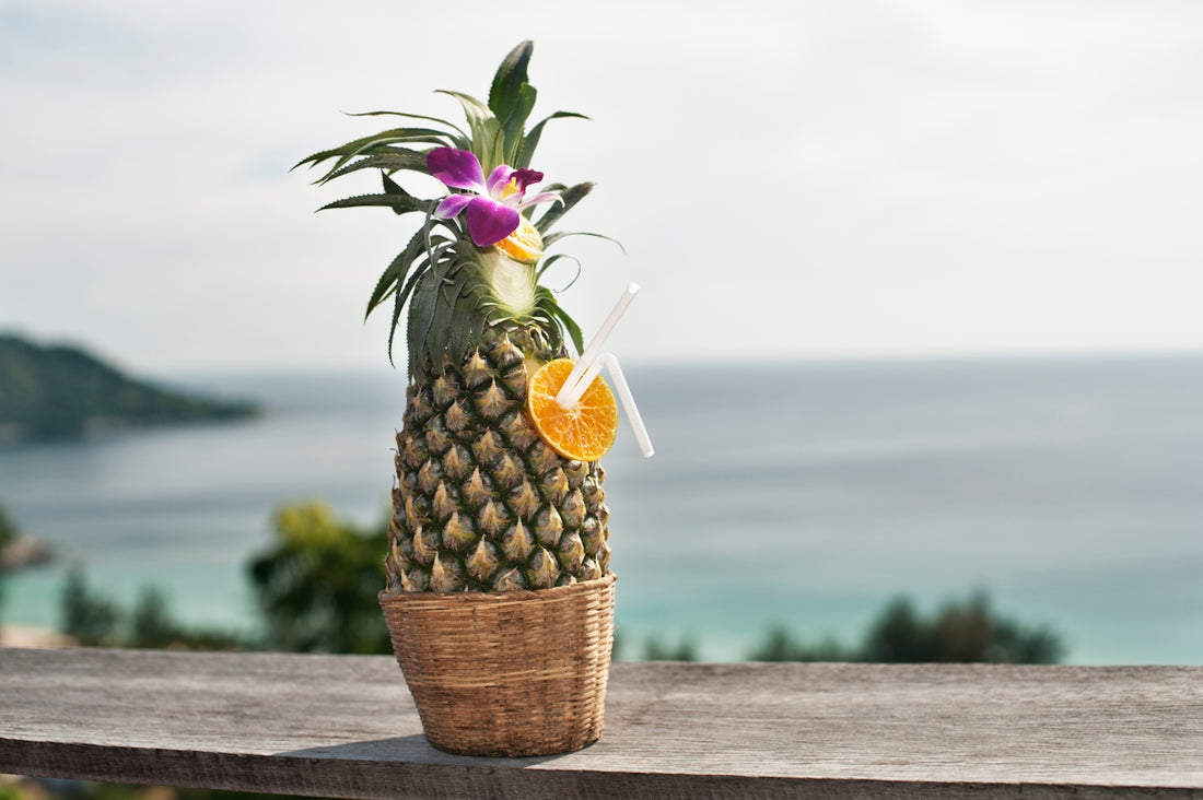 pineapple fruit on brown wooden table
